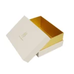 Rigid gift box with gold inner neck