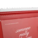 Pink shipping box with tear zipper