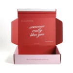 Corrugated e-commerce shipping box with tear strip