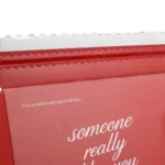 Easy open corrugated mailing box with tear strip